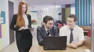 Three Business People Meeting In Office. | Stock Footage - Envato elements