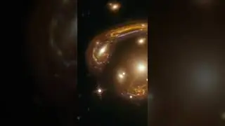 NASA Hubble Space Telescope : Molten Galaxy  Einstein Ring ( Gravitational Lensing ) 