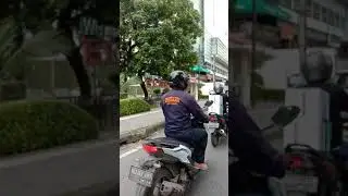 Grab bike ride in city center Medan, Indonesia