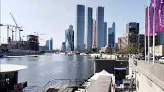 Along Moscow river. Skyscrapers, "tesla bus" is floating and other attractions