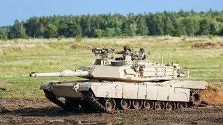 Soldiers of NATO Conduct Live Fire Exercise with M1A2 Abrams Tank at Poland