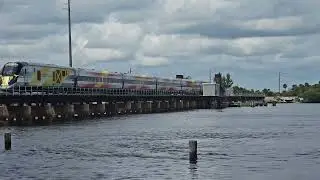Brightline Brightred north across the St Lucie Waterway