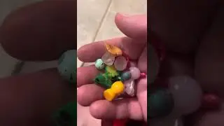 Scooping beads in a cup ASMR