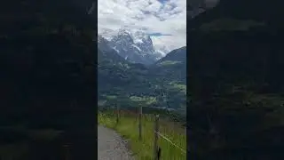 Swiss mountain panorama with waterfall#nature #swissalps #village #youtubeshorts 🇨🇭🇨🇭