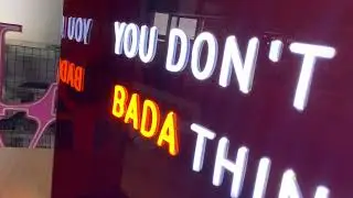 Custom Neon Signs Mounted in Brown Acrylic Boxes