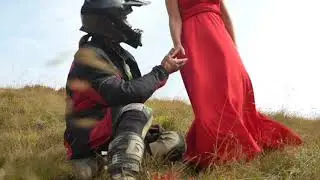 Lady in red and biker