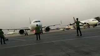 Marshalling of aircraft A320.