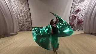 belly dance rehearsal with wings on stage