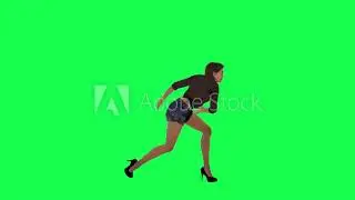 An English rebel woman in a brown dress and black shorts picks up a stone from the ground and