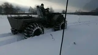 Движение по двум свежим колеям от мотособаки.