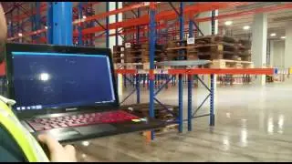 Infinium-Scan drone conducting inventory stock taking at a warehouse in Singapore
