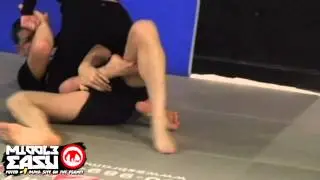 Ronda Rousey grapples Nick Diaz in the 209