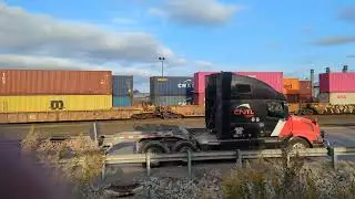 CN Locals EMD GP38-2 7502 GP38-2 4708 & GP38-2 4936 are pulling the Intermodal Cars to Malport