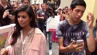 Khloe, Kourtney and kim Kardashian dealing with a dumb fan -- 2015