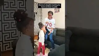 mummy teaching her daughter how to sit in public 