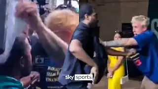 Jake Paul steals Floyd Mayweather's hat and gets punched by bodyguard!