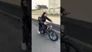 My sister is riding a motorcycle for the first time