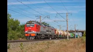Ульяновский 2ТЭ25КМ-0476  с грузовым поездом