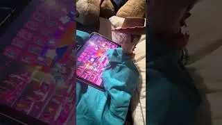 Woody watching Toy Story 2 while being cozy in bed.