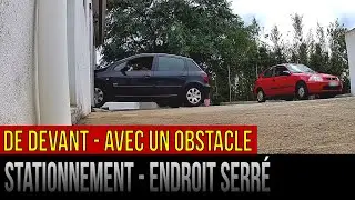 Stationnement dans un endroit serré:  de devant– avec un obstacle