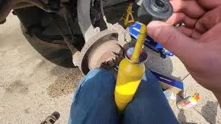 How to replace front shock 2004 Dodge Ram 1500 5.7L Hemi