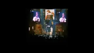 Dre and Snoop tribute to Tupac in a concert.