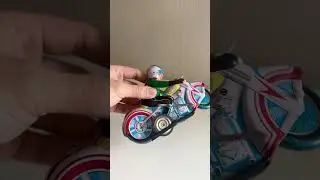 Заводная, жестяная игрушка - Мотоциклист MS-702 (602), старый Китай