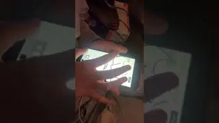 Daughter drawing on her phone