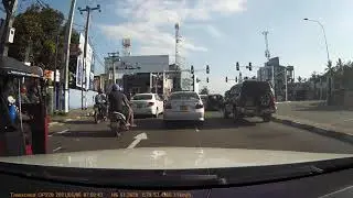 Careless oldtimer almost sideswipes another car - watch what that white car does!