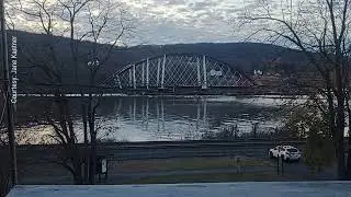 Section of Portal North Bridge is ferried down Hudson River