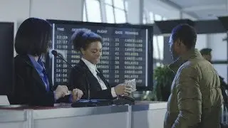 Smiling Female Security Agent at an Airport | Stock Footage - Videohive