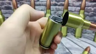 Оригинальная зажигалка в виде патрона от крупнокалиберных пулемётов