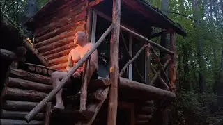 A man settled in a dense forest | Cooked potato pancakes with meat over a fire.