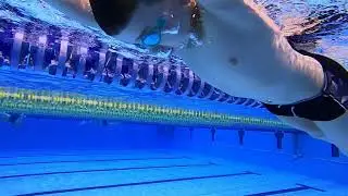 Blowing BUBBLES through the nose under the WATER in the POOL. SWIMMING.