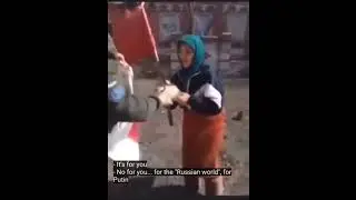 WTF! Old lady with Soviet flag mistakes Ukrainian soldiers for Russians, soldier makes fun of her!