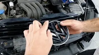 How do I remove the WV badge on a Jetta?