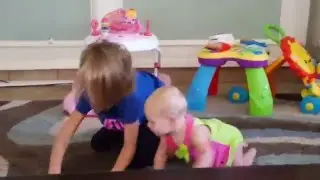 Teaching Brooklynn Somersaults  11months old