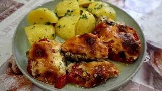 Juicy and tender baked turkey fillet with mushrooms and tomatoes under a cheese crust