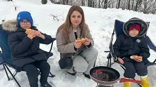WE ATE SAUSAGE AND BREAD IN THE SNOW!! WE MADE A SNOWMAN