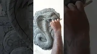 snake cement art