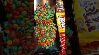 Relaxing ASMR: Mesmerizing M&M Scoop Sounds #satisfying #shorts