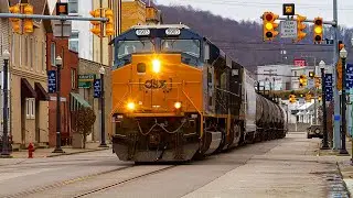 Brand New EMD ST70AH leads CSX Q317 down the street!