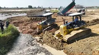 Massive Swamp Landfill 2 Bulldozer KOMATSU Pushing Clearing Soil Mix With Stone Truck Unloading