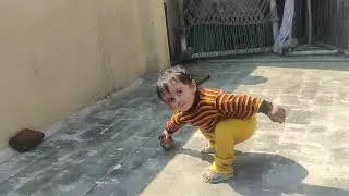 beautiful baby boy bowling his Mamu
