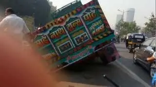 Truck's Left Rear Tyre in roads Gutter Lid (BROKEN)