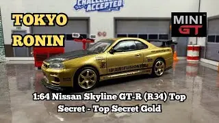 The Icon of Automotive Culture: Nissan Skyline GT-R (R34) Top Secret - Top Secret Gold - Mini GT