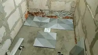 Пол в душевой.