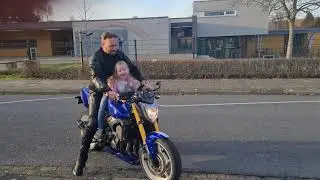 Daughters first ride on a motorcycle