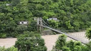 Saryu River Bridge in Champawat district of Uttarakhand, as monsoon swollen brown water river flows
