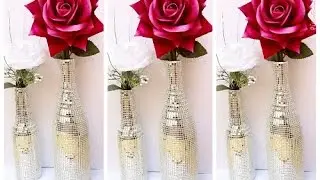 Garrafa decorada com fita espelhada
